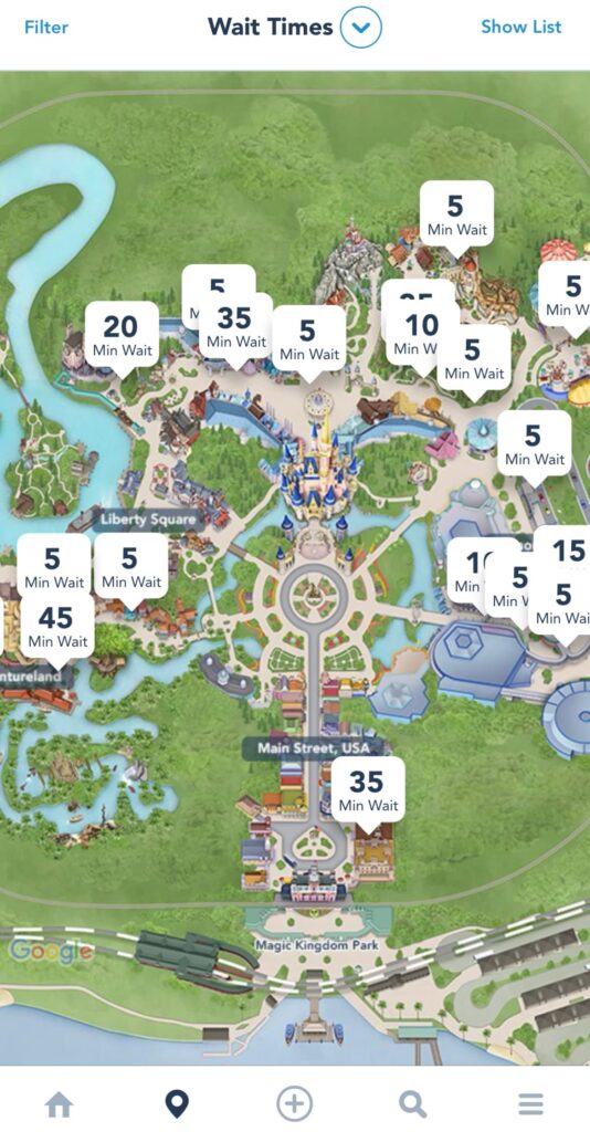 Print da tela de celular no app My Disney Experience que mostra o mapa do Magic Kingdom e seus respectivos tempos de fila para as atrações