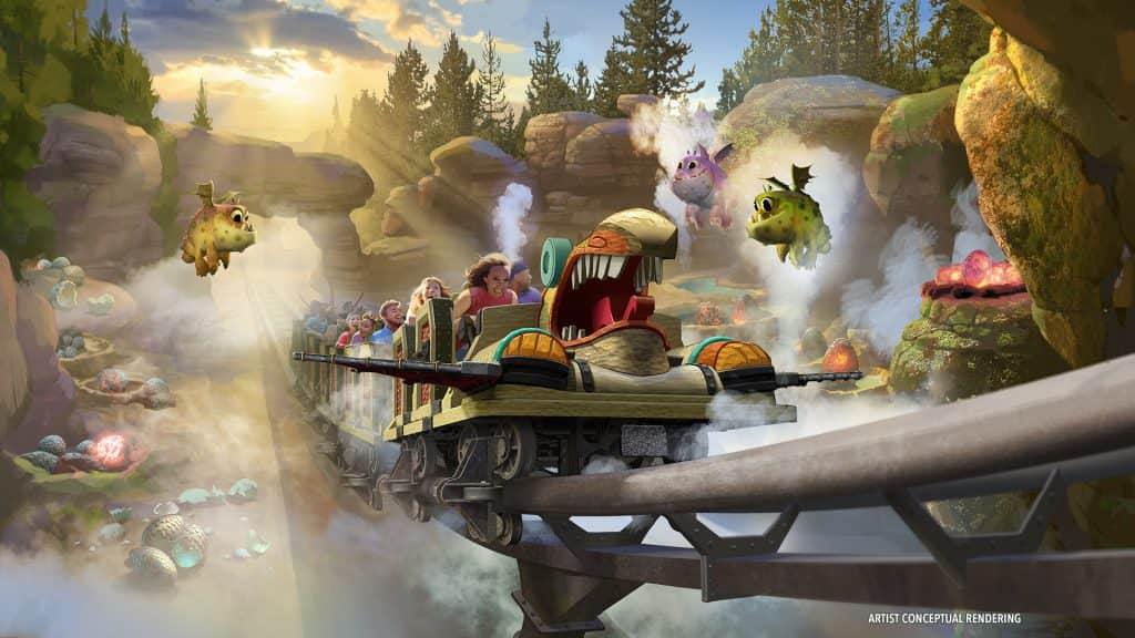 mais uma imagem ilustrativa de como será a montanha russa da area de como treinar o seu dragão no parque epic universe da universal orlando. nessa imagem podemos ver pequenos dragõezinhos alados flutuando ao redor de uma área que parece ter muitos ovos de dragões. o carrinho da montanha russa passa ganhando velocidade